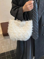 Soft faux fur fluffy plush shoulder bag by Trendsi, lightweight handbag with a cozy, plush texture and stylish design.