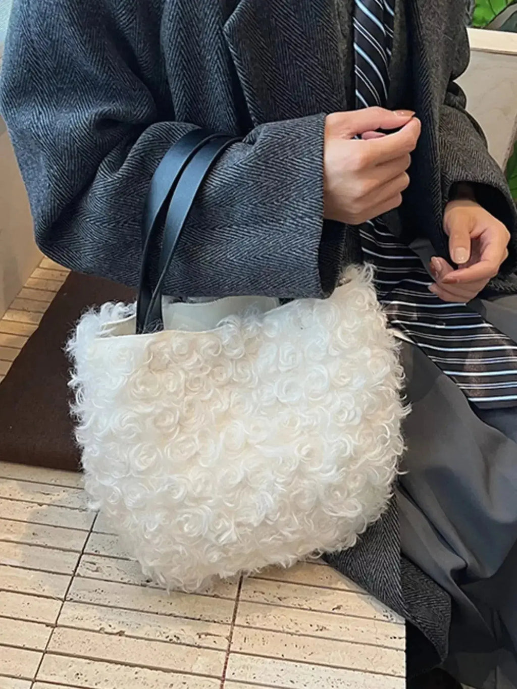 Lightweight fluffy plush shoulder bag by Trendsi with soft faux fur exterior and stylish handbag design.