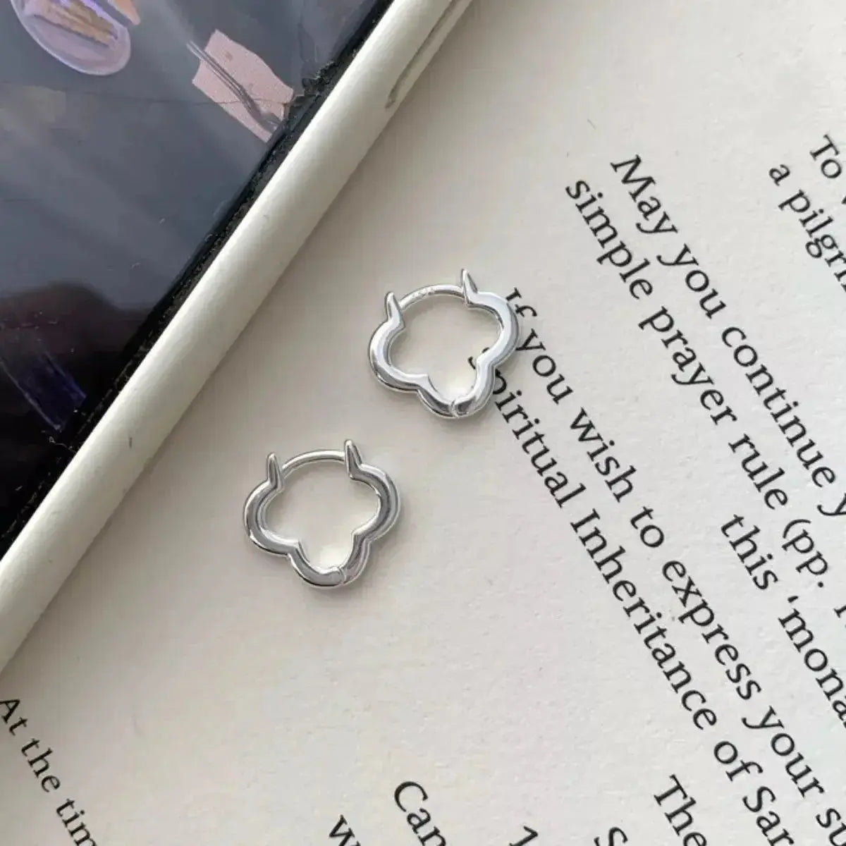 925 sterling silver four-leaf clover stud earrings featuring lucky jewelry design, perfect for adding a charming touch to any outfit.
