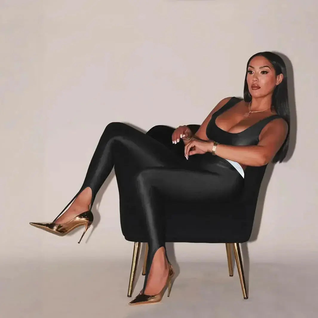 Shiny black stretch leggings by Plush Fashion Hub, front view showing high-gloss, fitted design and smooth fabric.