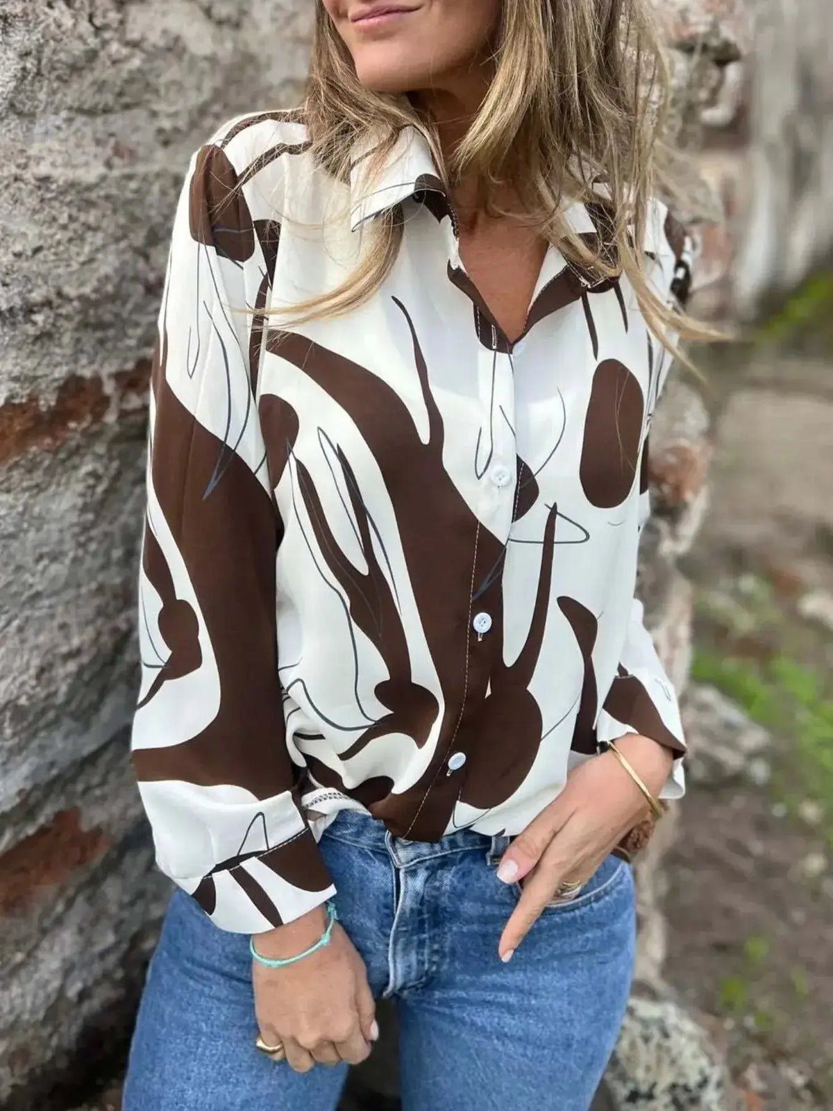 Plus size women's stretch abstract print long sleeve button-up shirt by Plush Fashion Hub, full view showing vibrant design and fit.