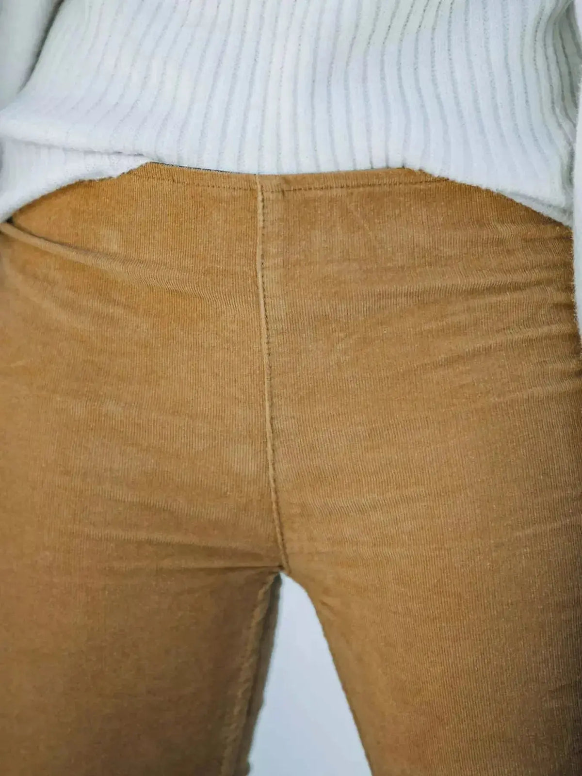 Plus size women's high-waisted corduroy flare pants by Plush Fashion Hub, shown in full length with boho style.