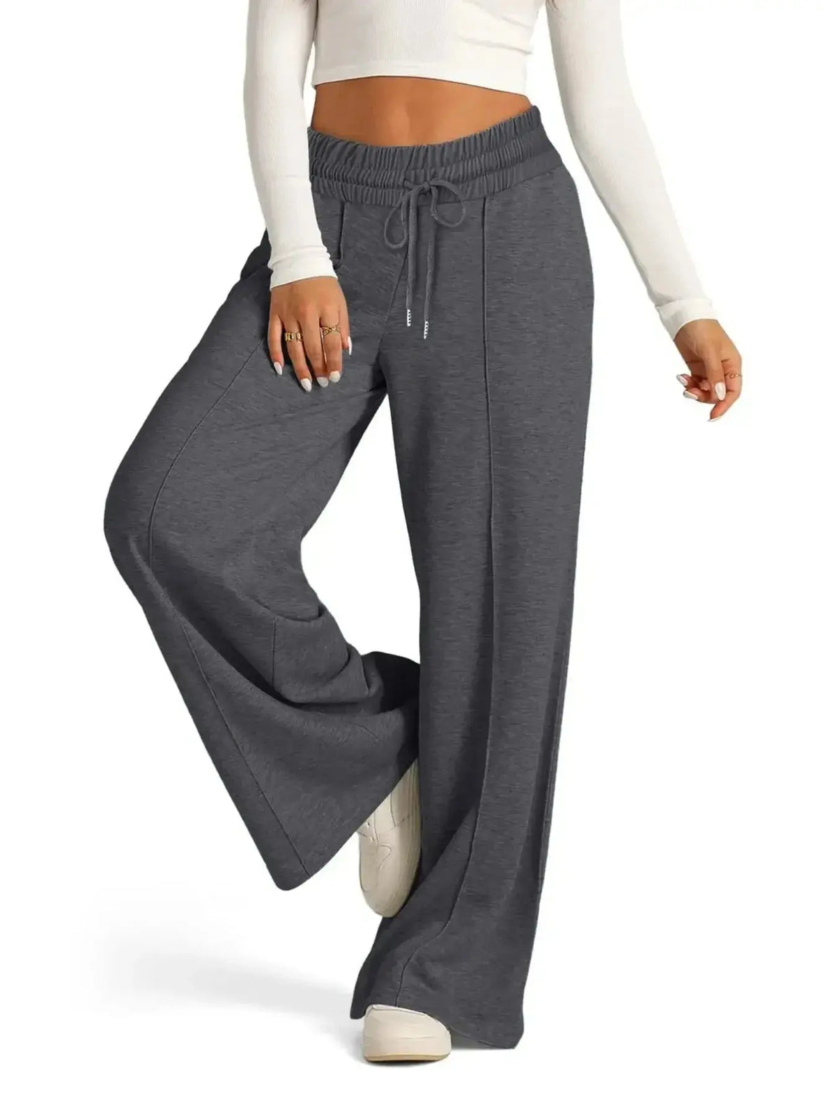 Plus size women's relaxed fit wide-leg lounge pants with drawstring waist by Plush Fashion Hub, casual and comfortable for home or errands.