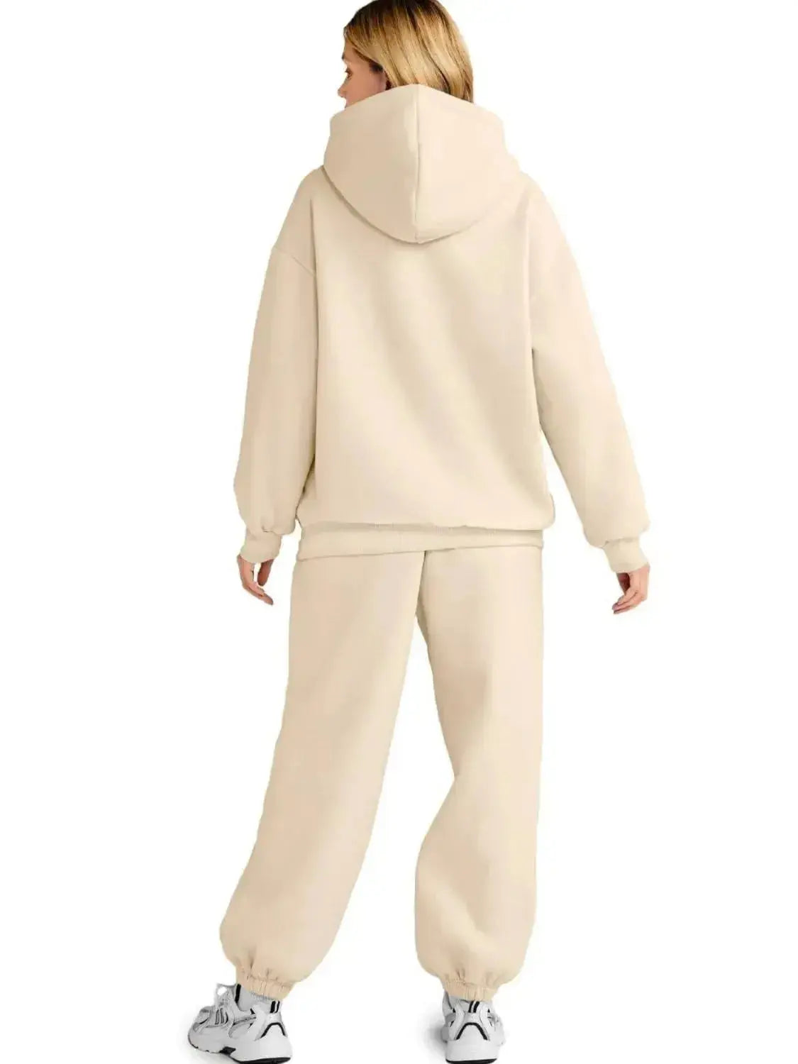 Plus size women’s hoodie and jogger sweat suit with kangaroo pocket from Plush Fashion Hub, full view of cozy loungewear set.