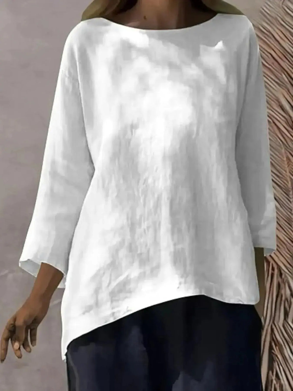 Plus size women's relaxed fit casual shirt with a round neckline, soft stretch fabric, from Plush Fashion Hub.