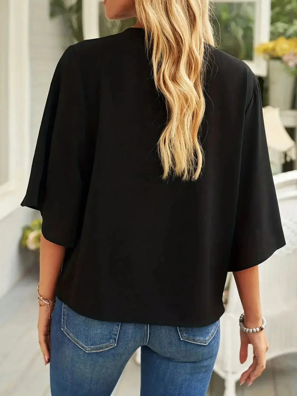 Plus size women's ruched three-quarter sleeve workwear blouse from Plush Fashion Hub, shown in full size with flattering fit.