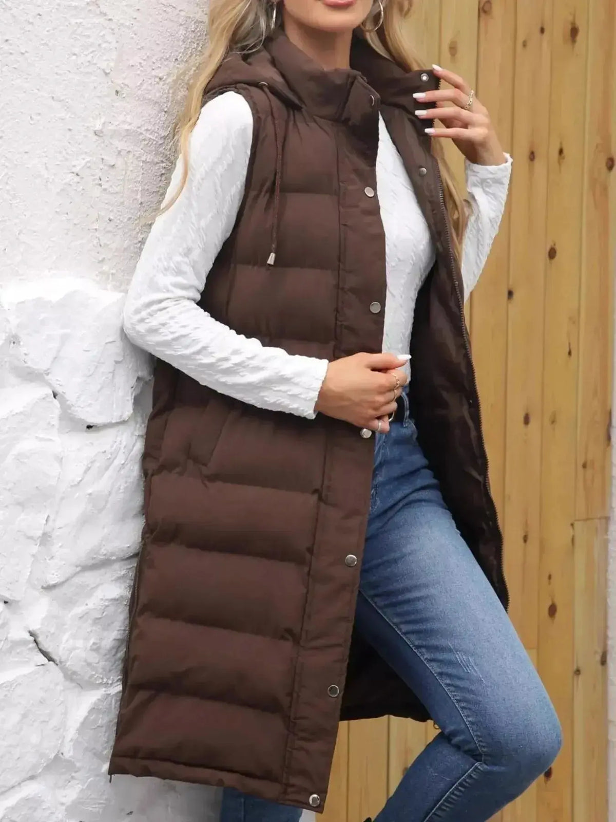 Longline padded hooded vest for women by Plush Fashion Hub, lightweight sleeveless jacket with snap-down front and cozy design.