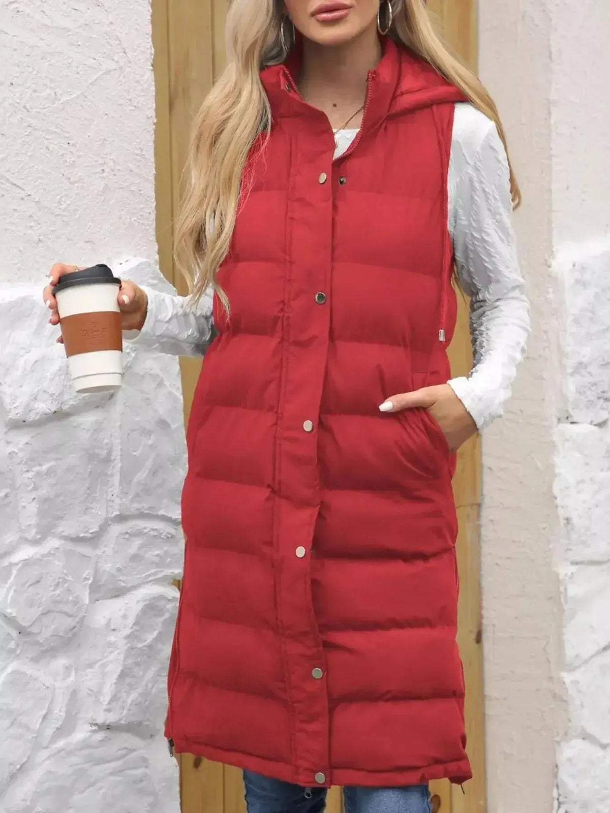 Women's longline padded hooded vest by Plush Fashion Hub, sleeveless lightweight jacket with snap-down hood and cozy plush design.