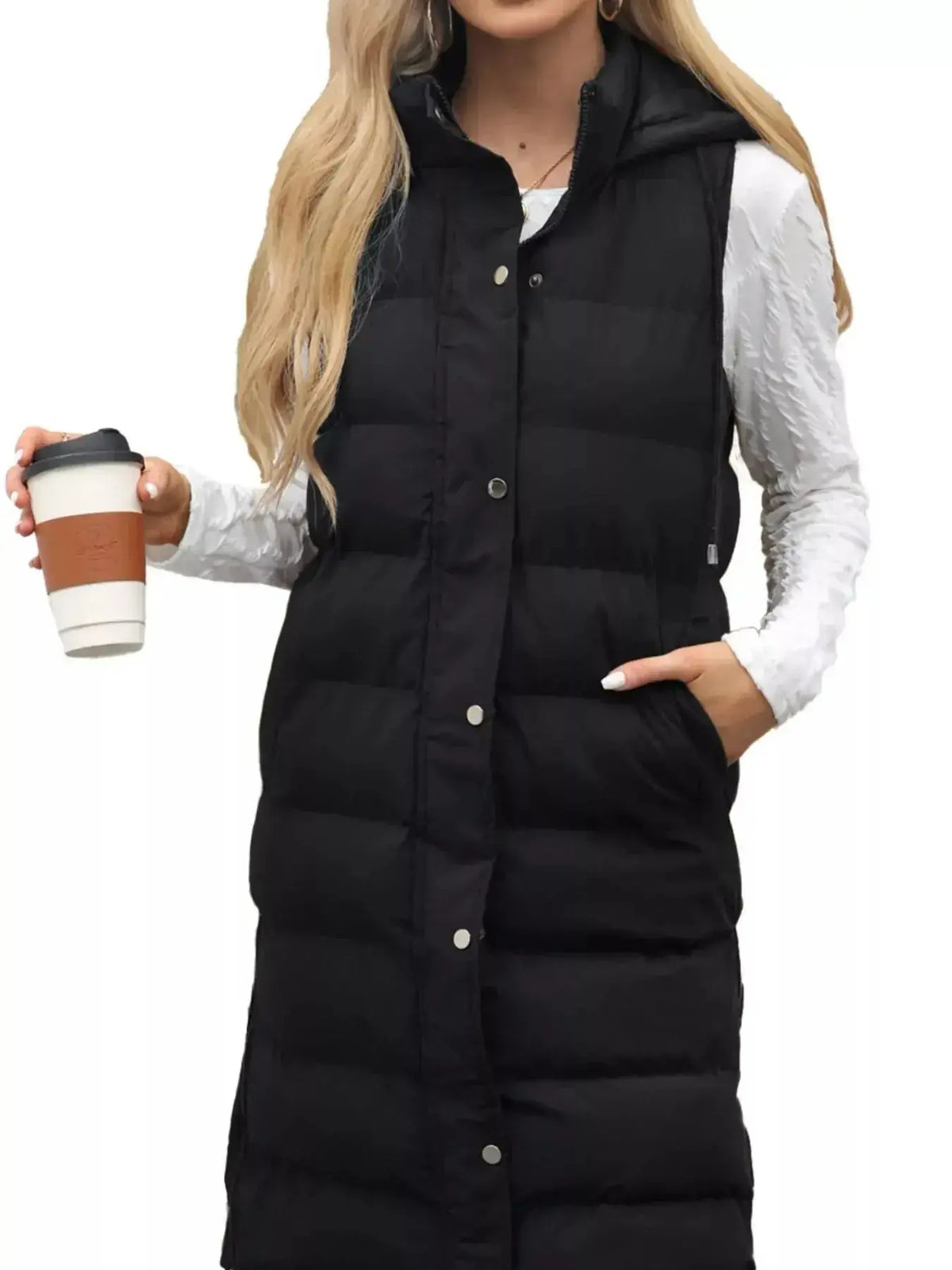 Full-length women's padded hooded vest in a sleeveless lightweight jacket style from Plush Fashion Hub, featuring snap-down front.