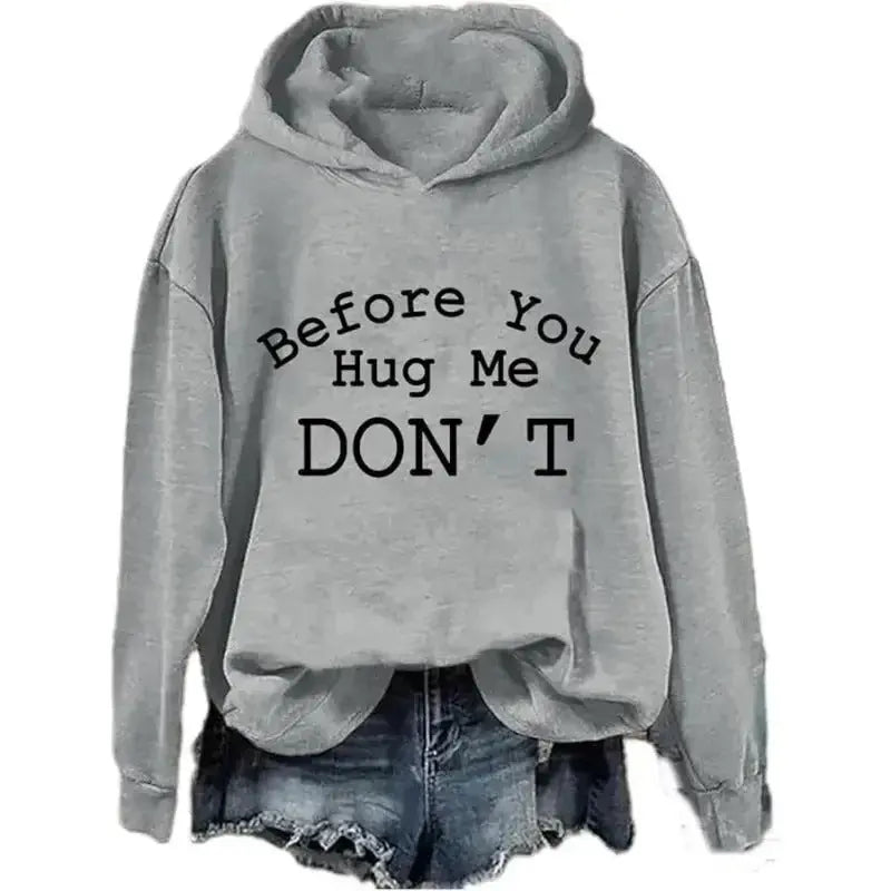 Unisex cozy street style hoodie with graphic print from Plush Fashion Hub, featuring a comfortable fit and bold design.