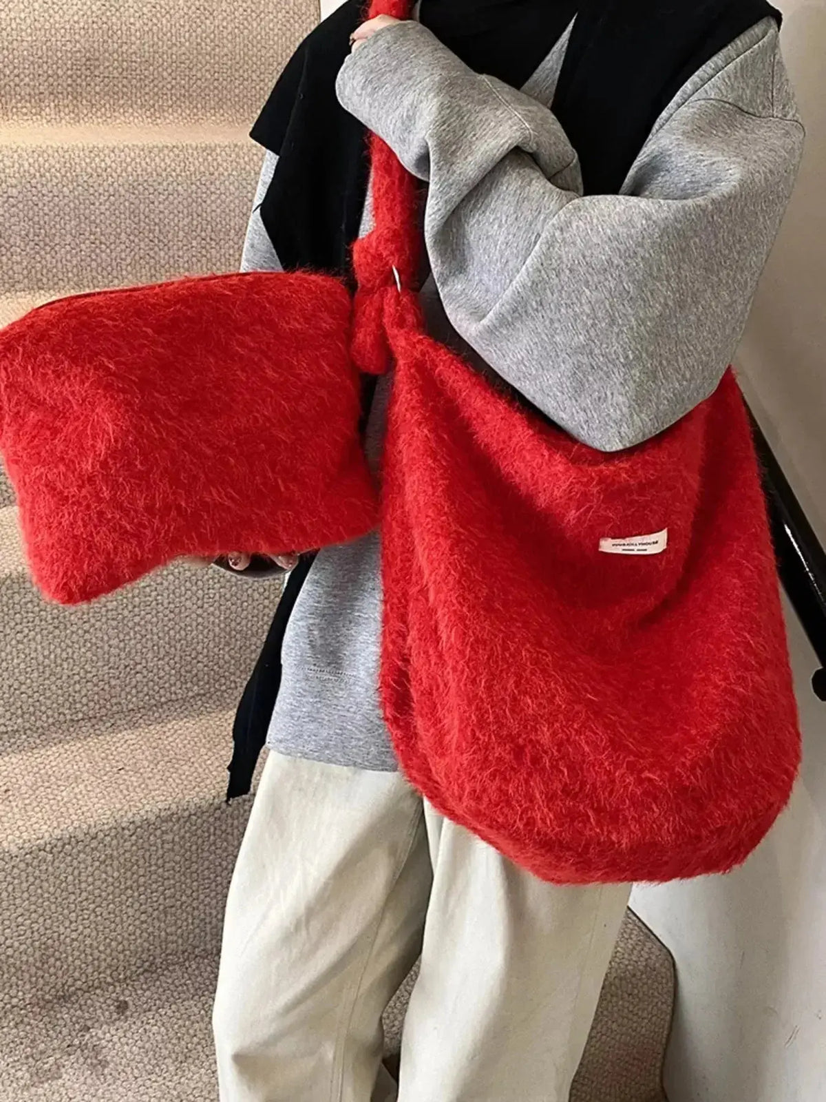 Fuzzy solid color crossbody bag by Plush Fashion Hub with soft plush texture and adjustable strap, perfect for casual wear.