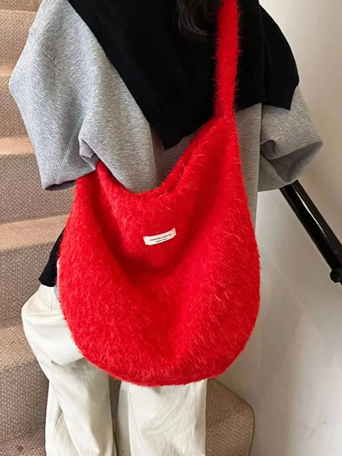 Soft fuzzy solid color crossbody bag by Plush Fashion Hub featuring a cozy plush texture and sleek design.