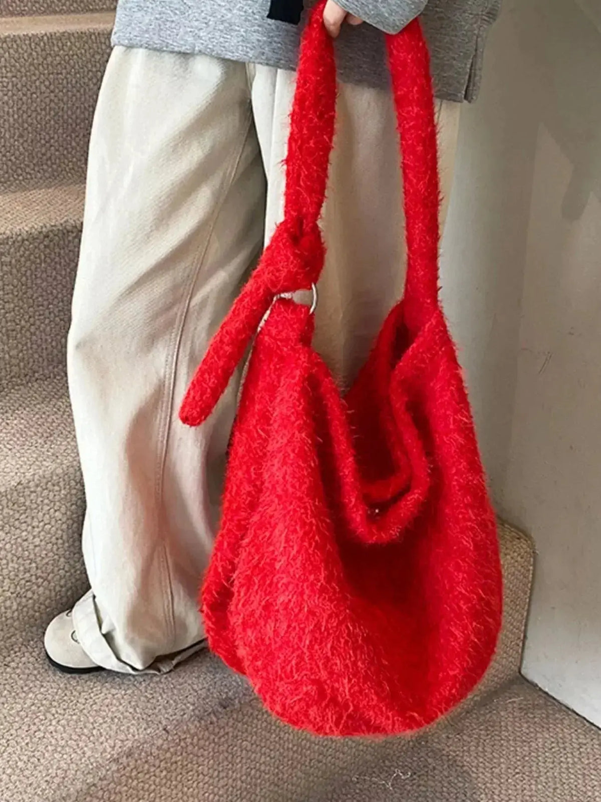 Soft fuzzy solid color crossbody bag from Plush Fashion Hub, featuring a plush texture and adjustable strap.