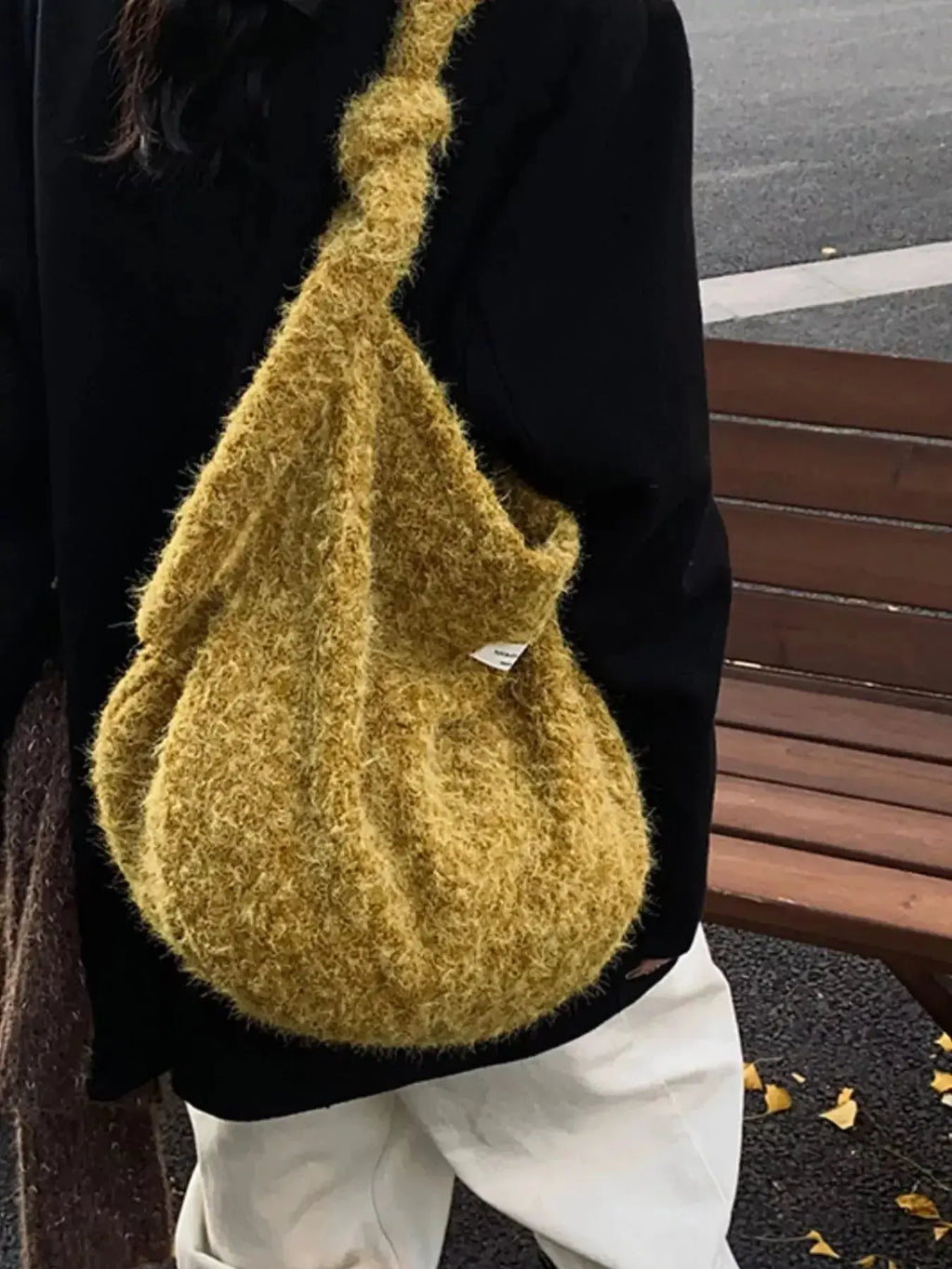 Fuzzy solid color crossbody bag from Plush Fashion Hub with plush texture and adjustable strap, suitable for casual wear.