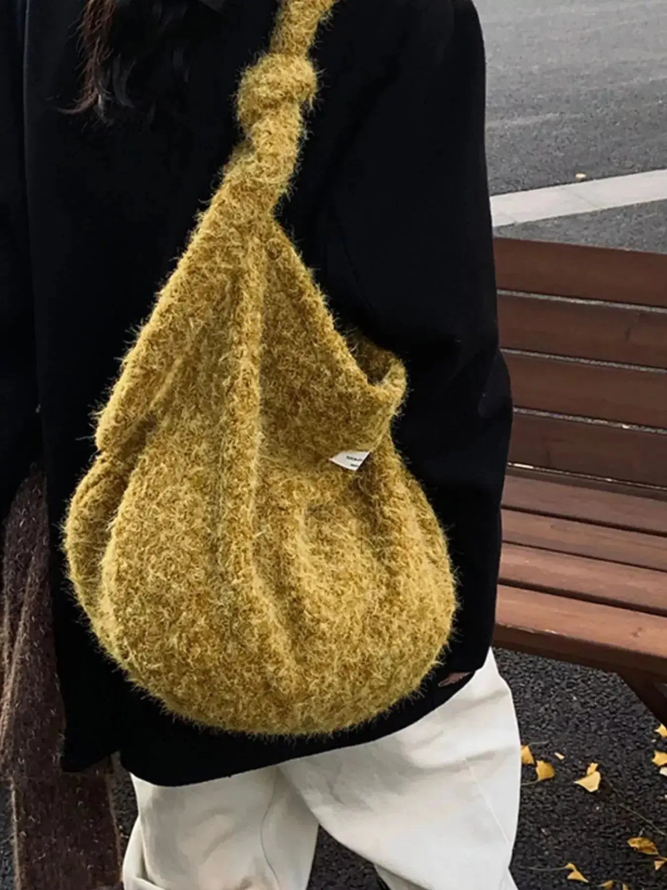 Fuzzy solid color crossbody bag from Plush Fashion Hub with plush texture and adjustable strap, suitable for casual wear.