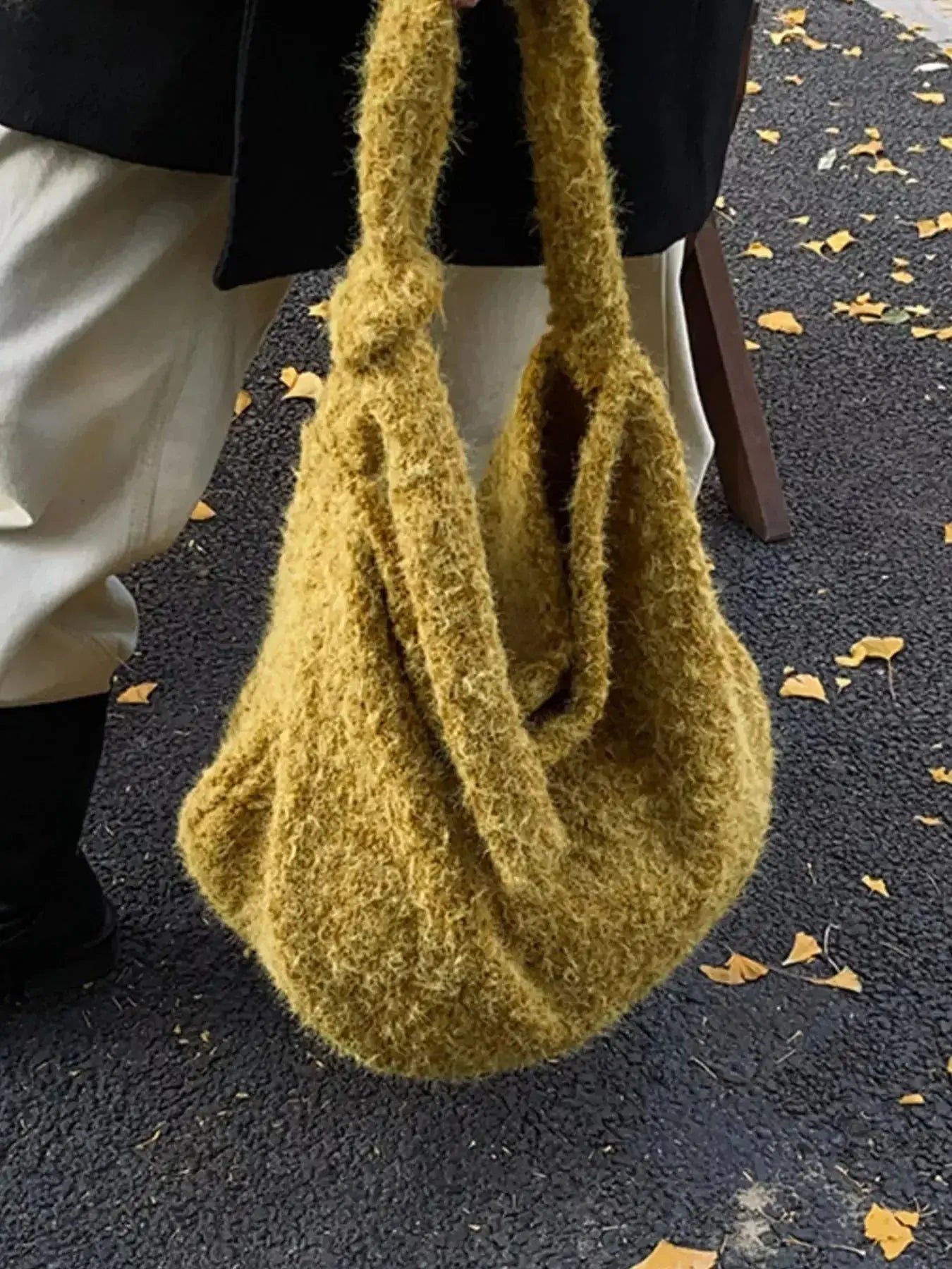 Fuzzy solid color crossbody bag from Plush Fashion Hub featuring plush material and a sleek, compact design.