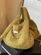 Fuzzy solid color crossbody bag from Plush Fashion Hub with plush texture and slim strap, perfect for casual wear.