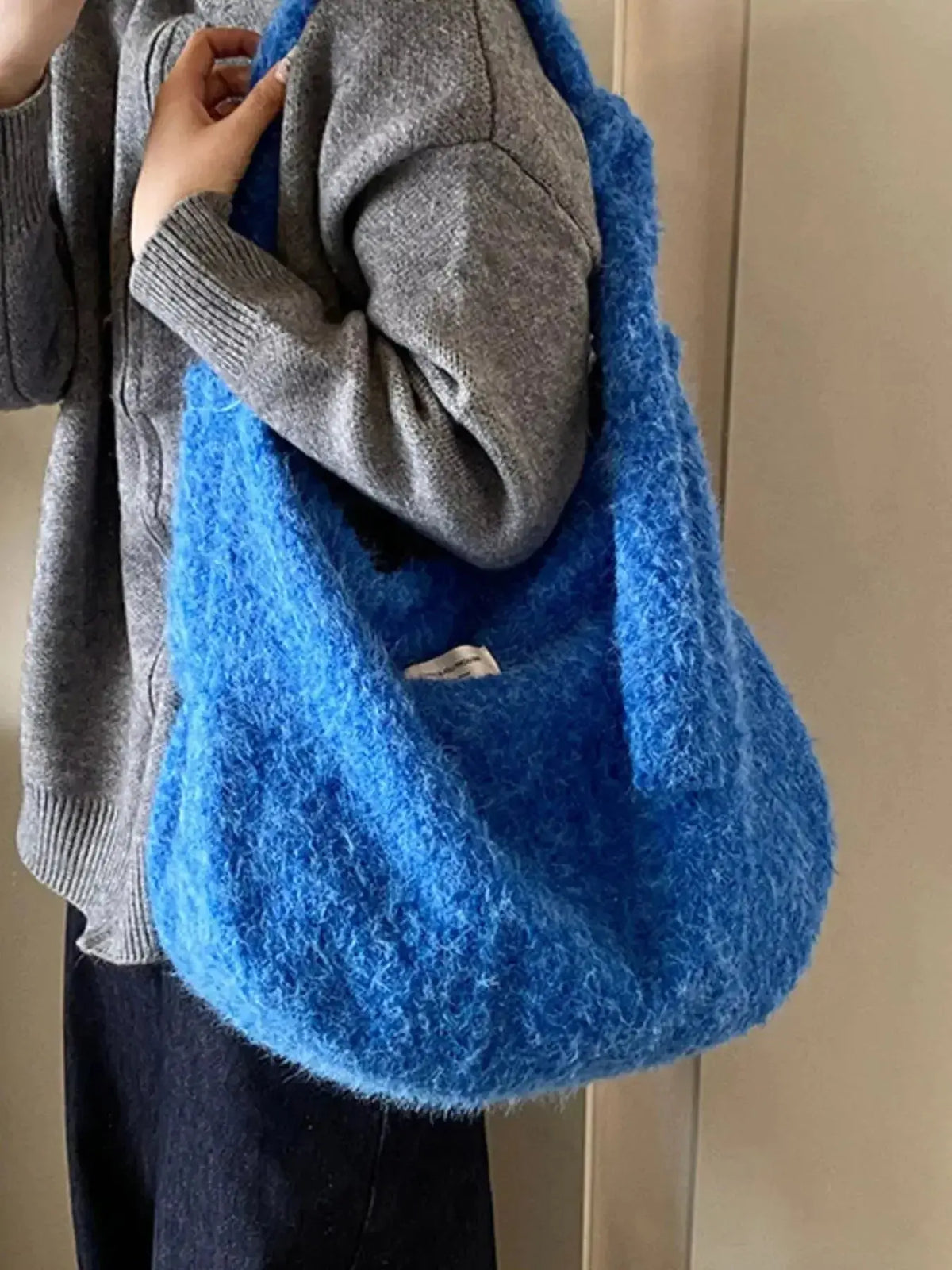 Soft fuzzy solid color crossbody bag by Plush Fashion Hub, featuring a plush texture and sleek design for everyday use.