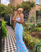 Elegant floral pleated maxi dress for women, trendy evening dress with a sophisticated design, perfect for special occasions.