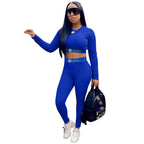 Women's two-piece sports set with letter print from Trendy Attic Store01, featuring a fitted top and matching leggings for activewear.