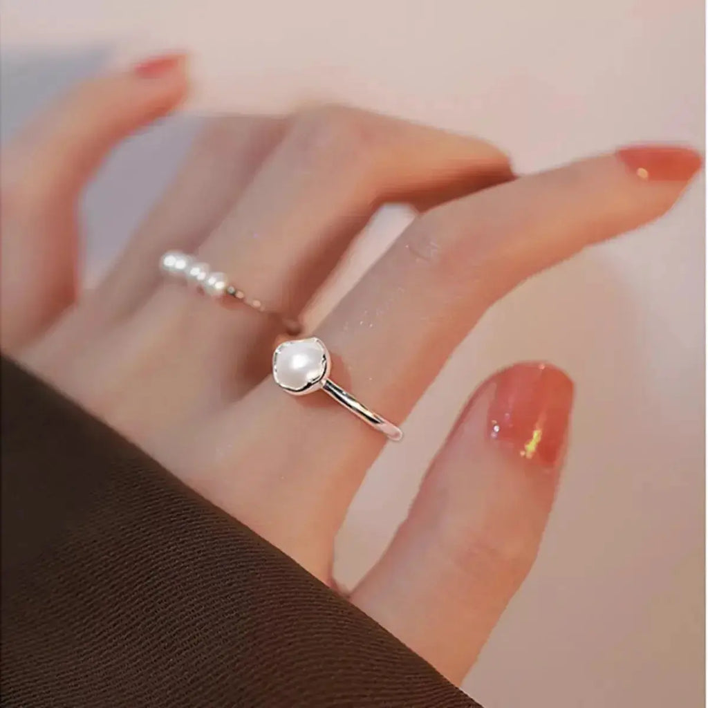 Genuine freshwater pearl adjustable open ring in 925 sterling silver with a sleek, modern design.