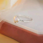 Sterling silver adjustable open ring with a genuine freshwater pearl, stylish jewelry accessory from Trendsi.