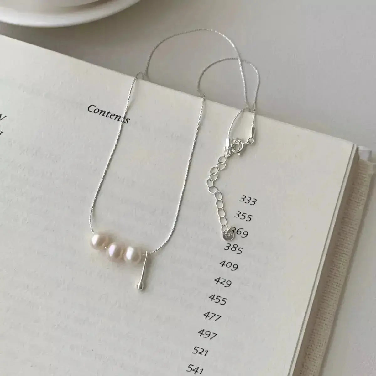 Genuine freshwater pearl and 925 sterling silver pendant necklace with elegant design, jewelry by Plush Fashion Hub.