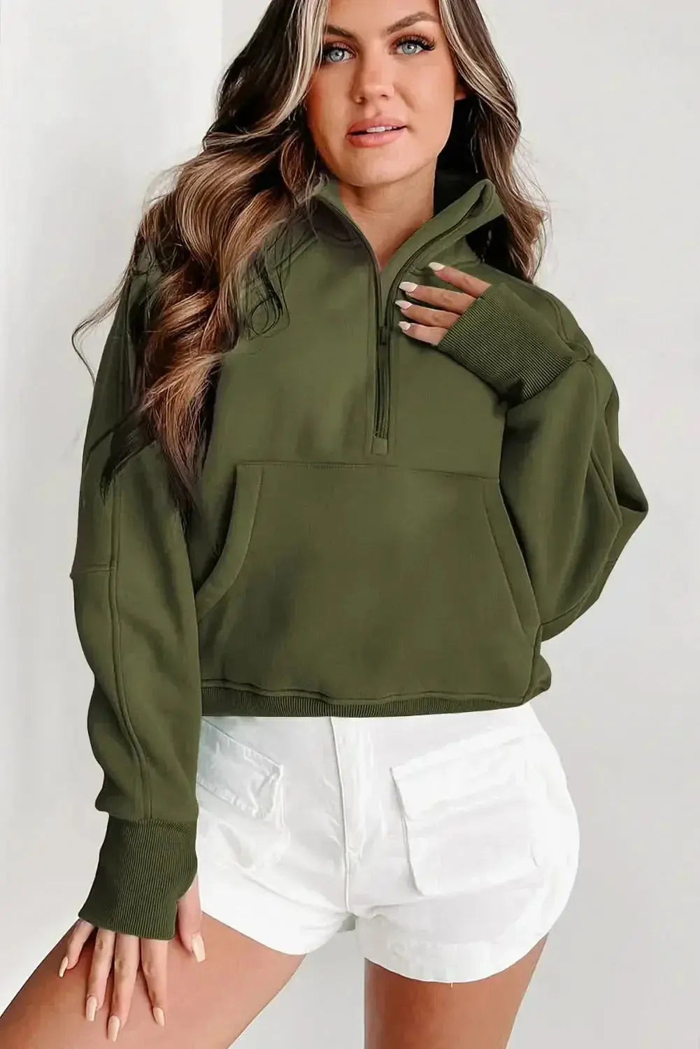 Women's green ribbed zip stand-collar sweatshirt with thumbhole sleeves, from Plush Fashion Hub, casual and comfortable fashion.