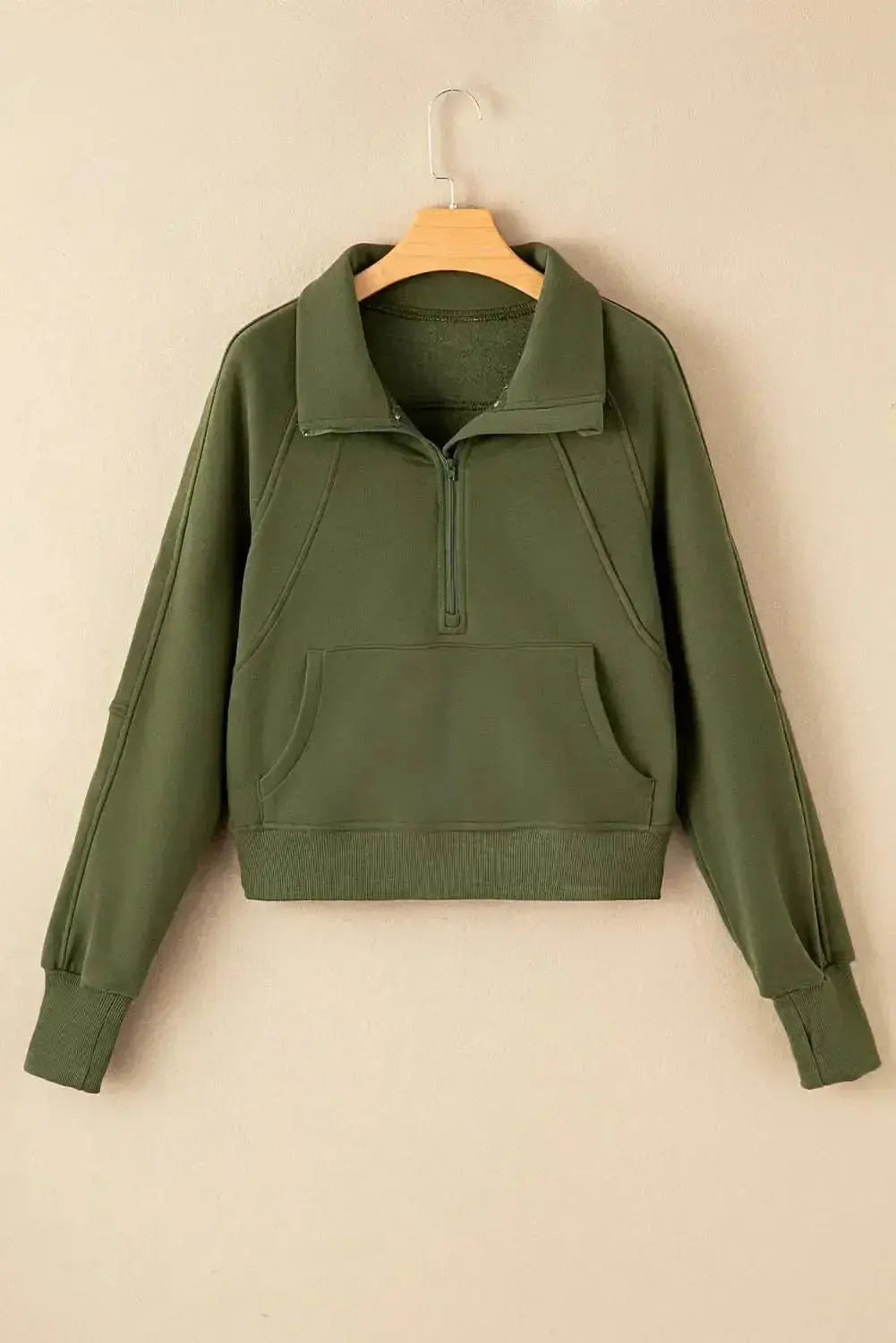 Green ribbed zip stand-collar sweatshirt for women with thumbhole sleeves from Plush Fashion Hub, casual and stylish.