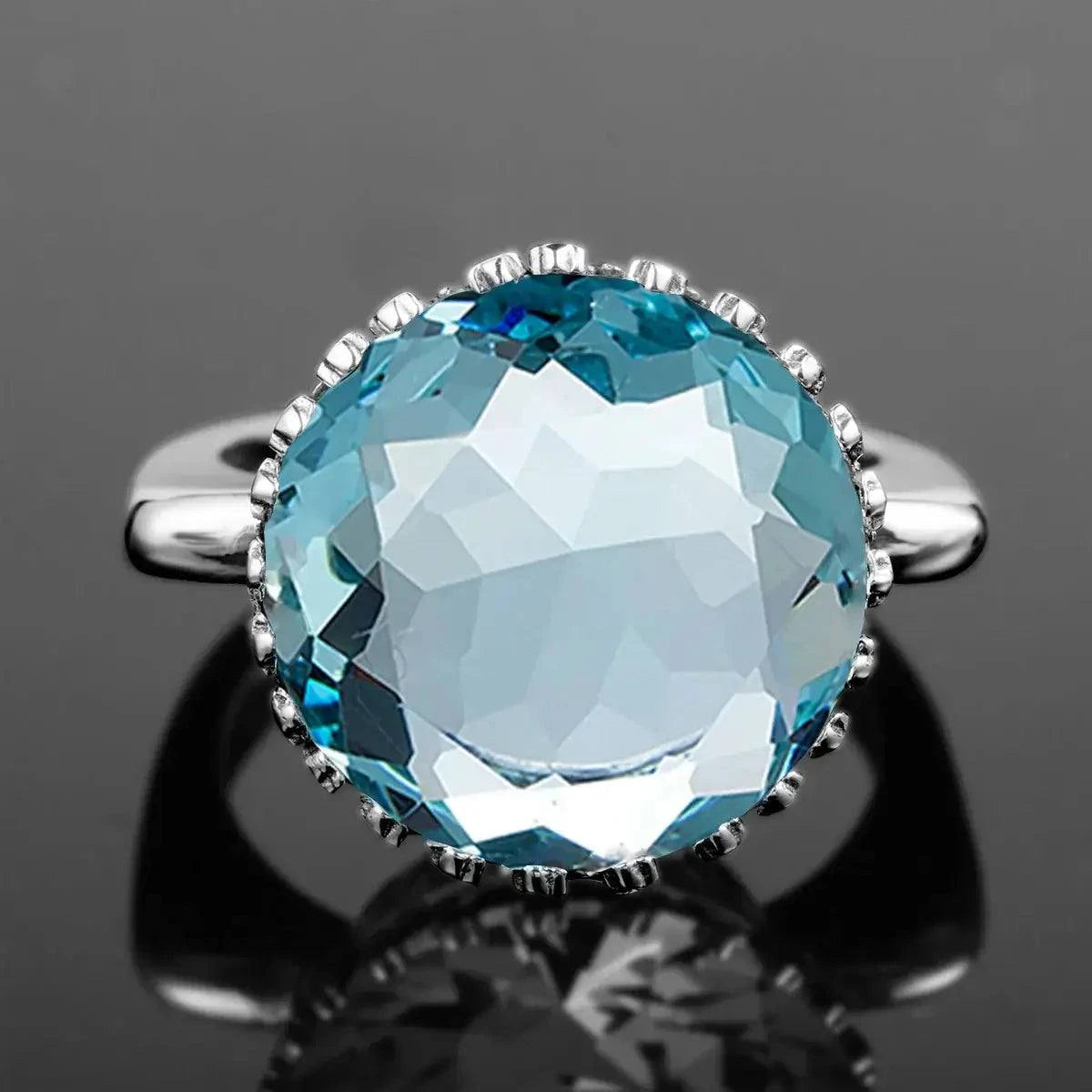 925 Sterling Silver 15ct Round Created Aquamarine Ring For WomenIndulge in elegance with this breathtaking 925 sterling silver ring featuring a stunning 15ct round created aquamarine. The perfect accessory for any occasion, this RingPlush Fashions ShopPlush Fashion Shop