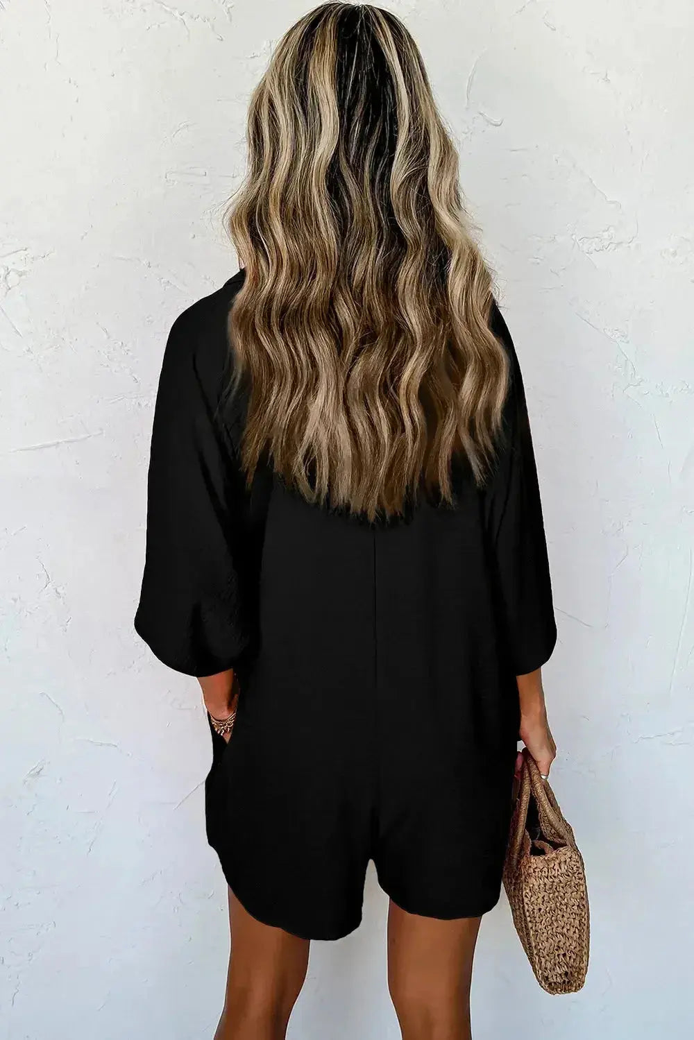 Women's lightweight half-button collared shirt romper by Plush Fashion Hub, featuring a relaxed fit and stylish design.