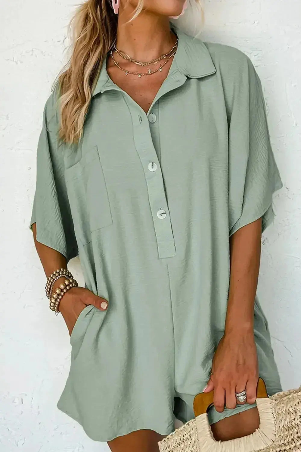 Women's lightweight collared shirt romper with half-button front and short sleeves, stylish shirt dress from Plush Fashion Hub.