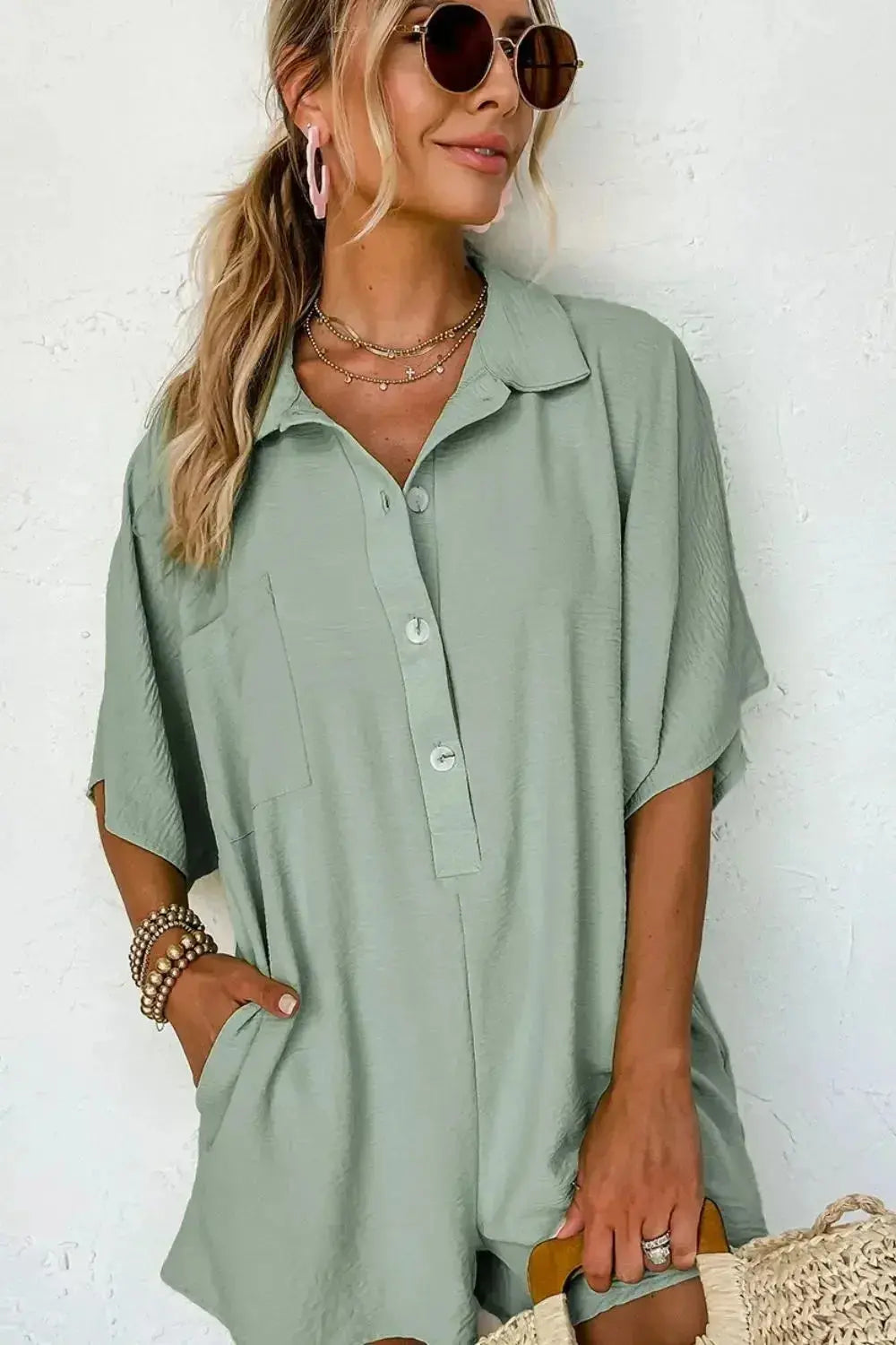 Women's lightweight collared shirt romper with half-button closure, featuring a casual shirt dress style from Plush Fashion Hub.