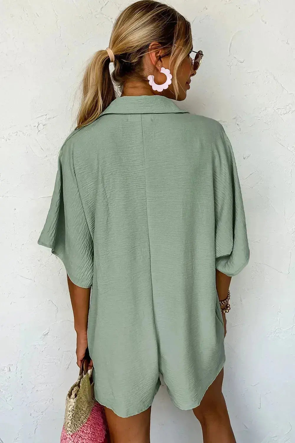 Women's lightweight collared shirt romper with half-button front, casual shirt dress style by Plush Fashion Hub.