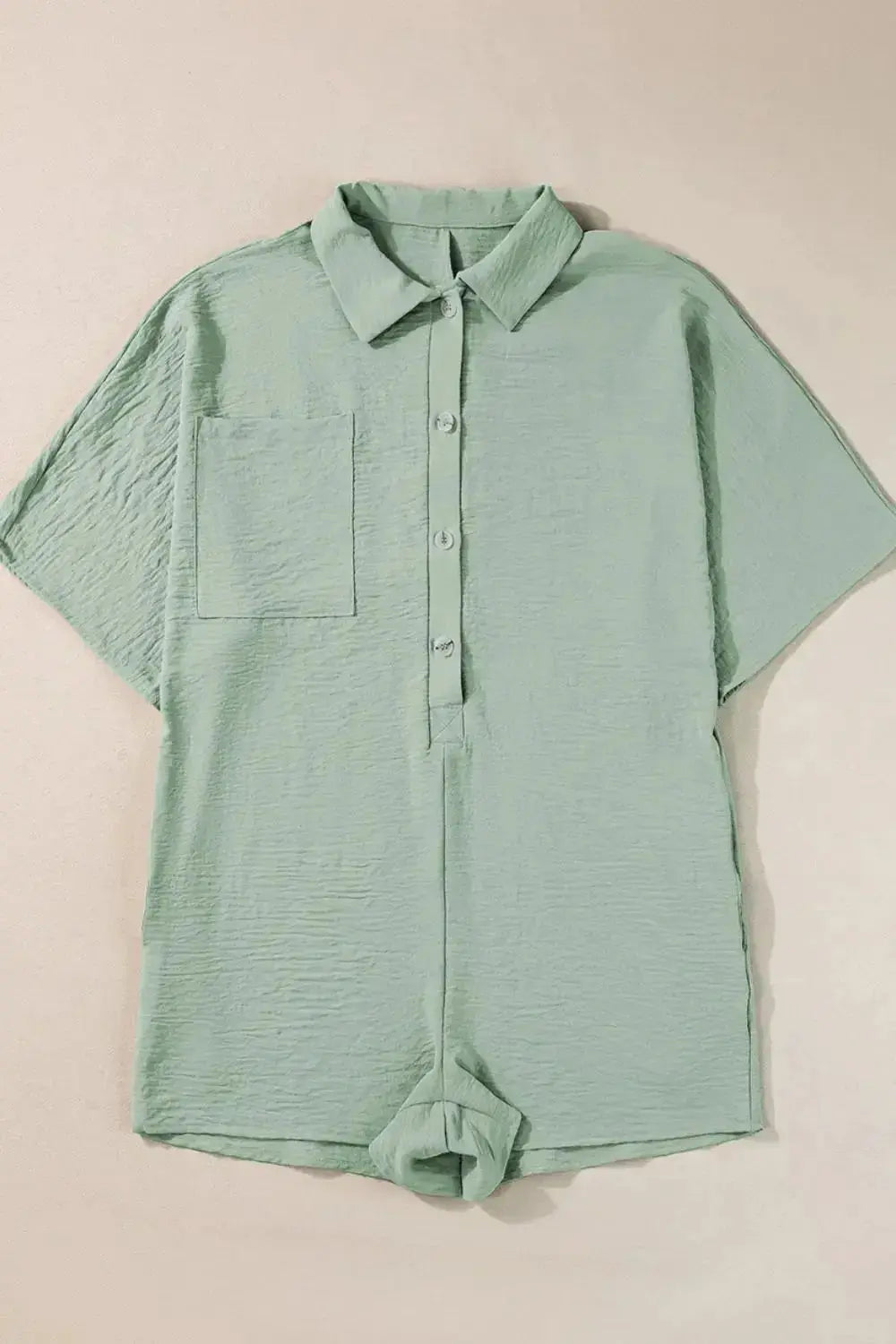 Women’s lightweight collared shirt romper with half-button front, ideal for casual summer wear, from Plush Fashion Hub.