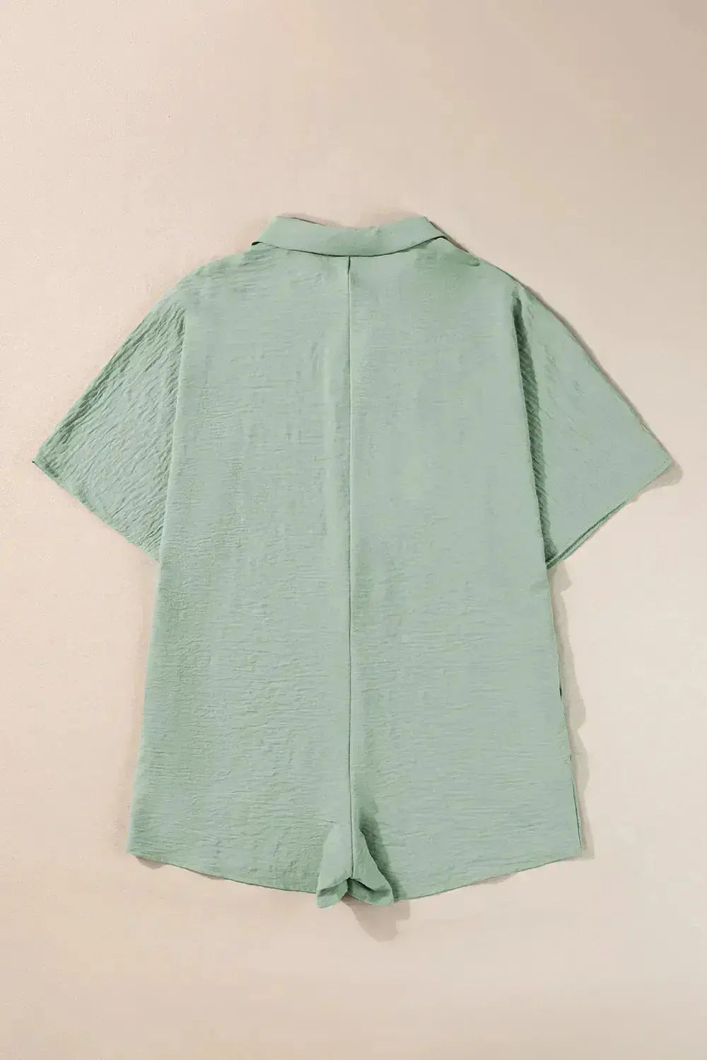 Women's lightweight collared shirt romper with half-button front, perfect for casual wear, by Plush Fashion Hub.