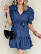 High-waist puff sleeve denim mini dress by Trendsi, casual summer dress made of soft cotton blend, perfect for warm weather.