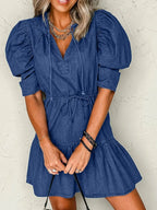 High-waist puff sleeve denim mini dress by Trendsi, made from soft cotton blend, perfect for casual summer wear.