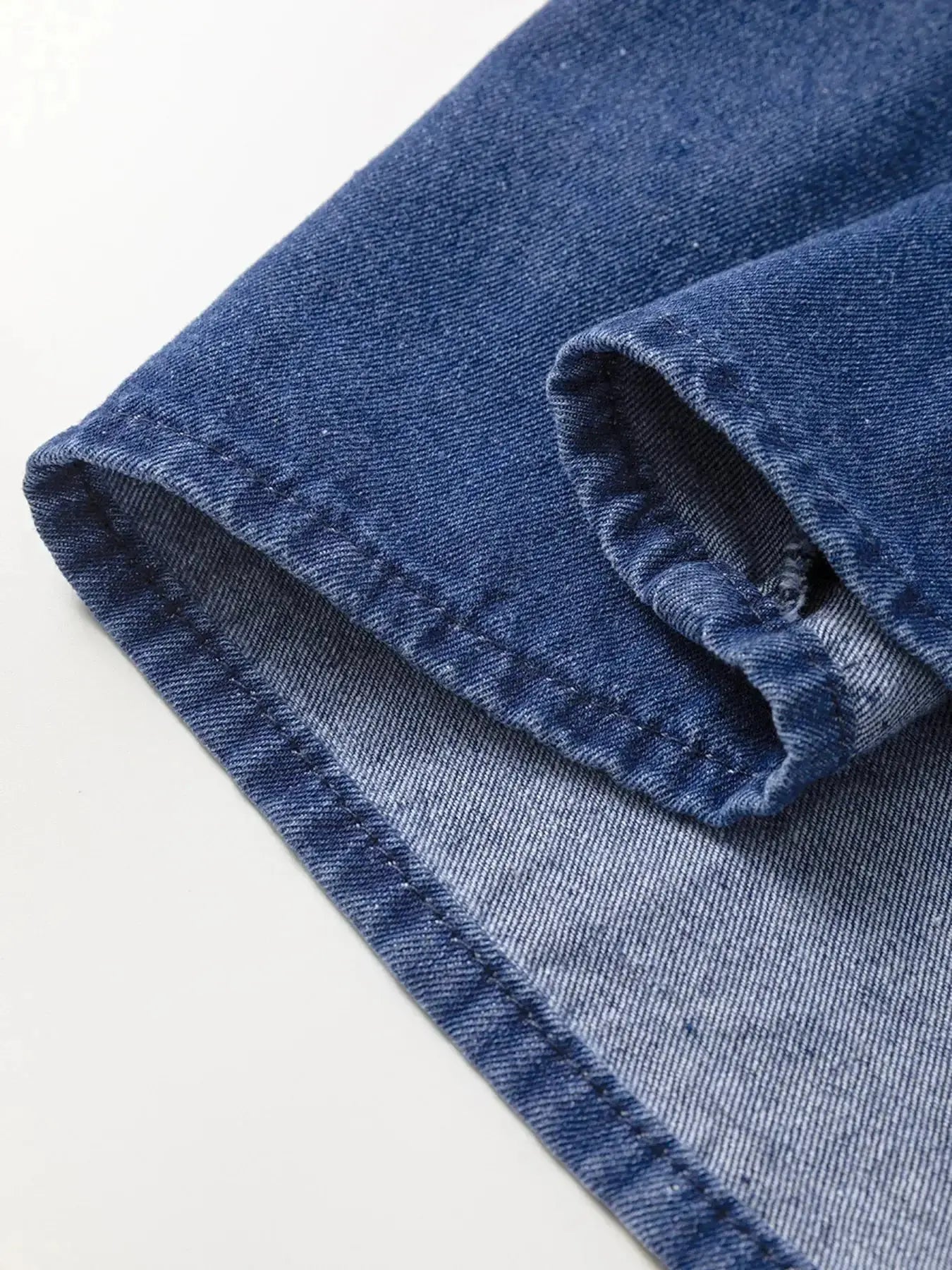 High-waist puff sleeve denim mini dress by Trendsi, made from soft cotton blend, perfect for casual summer wear.