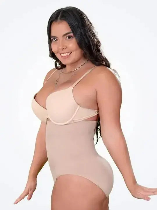 High-waisted seamless shapewear briefs with tummy control and butt-lift design, in a nude color, by Plush Fashion Hub.
