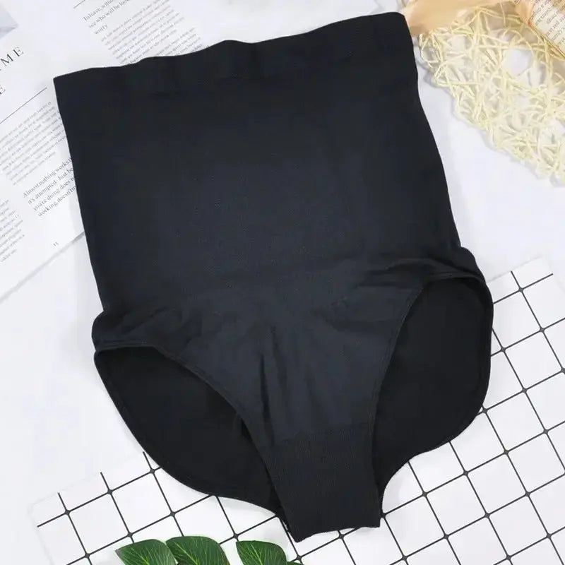 High-waisted seamless shapewear briefs with tummy control and butt-lift design, in nude color, by Plush Fashion Hub.