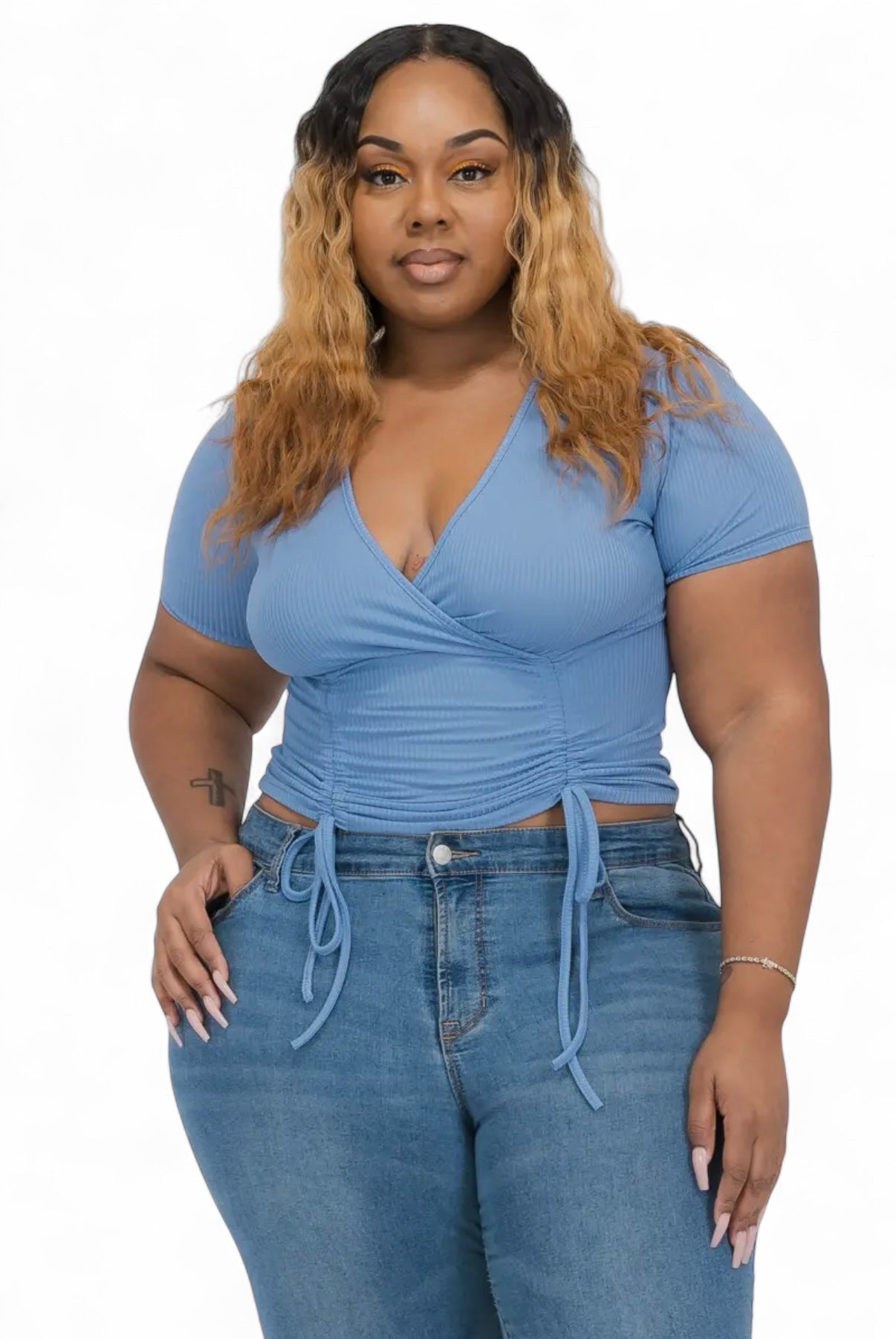Ribbed, ruched drawstring surplice top from Plush Fashion Hub featuring a fitted, curvy design and long sleeves.