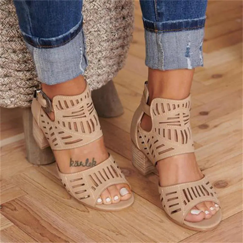 Women's floral cutout chunky heels sandal by Trendy Attic Store01, featuring open toes and stylish floral design.