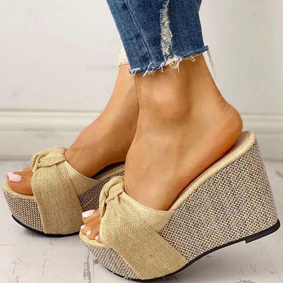 Women's bow sandals from Trendy Attic Store01 featuring stylish slip-on design and open toe for summer wear.
