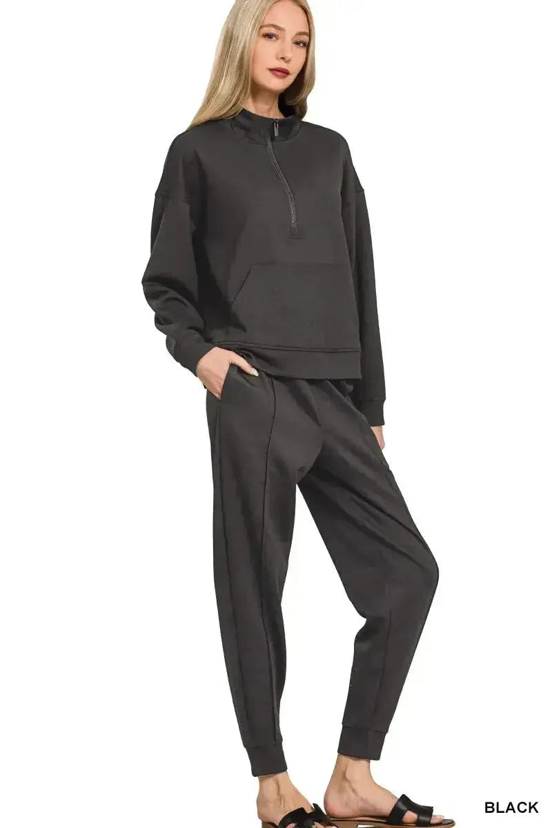 Women's plush fashion hub half-zip sweatshirt and joggers lounge set, featuring comfortable soft fabric and casual fit.