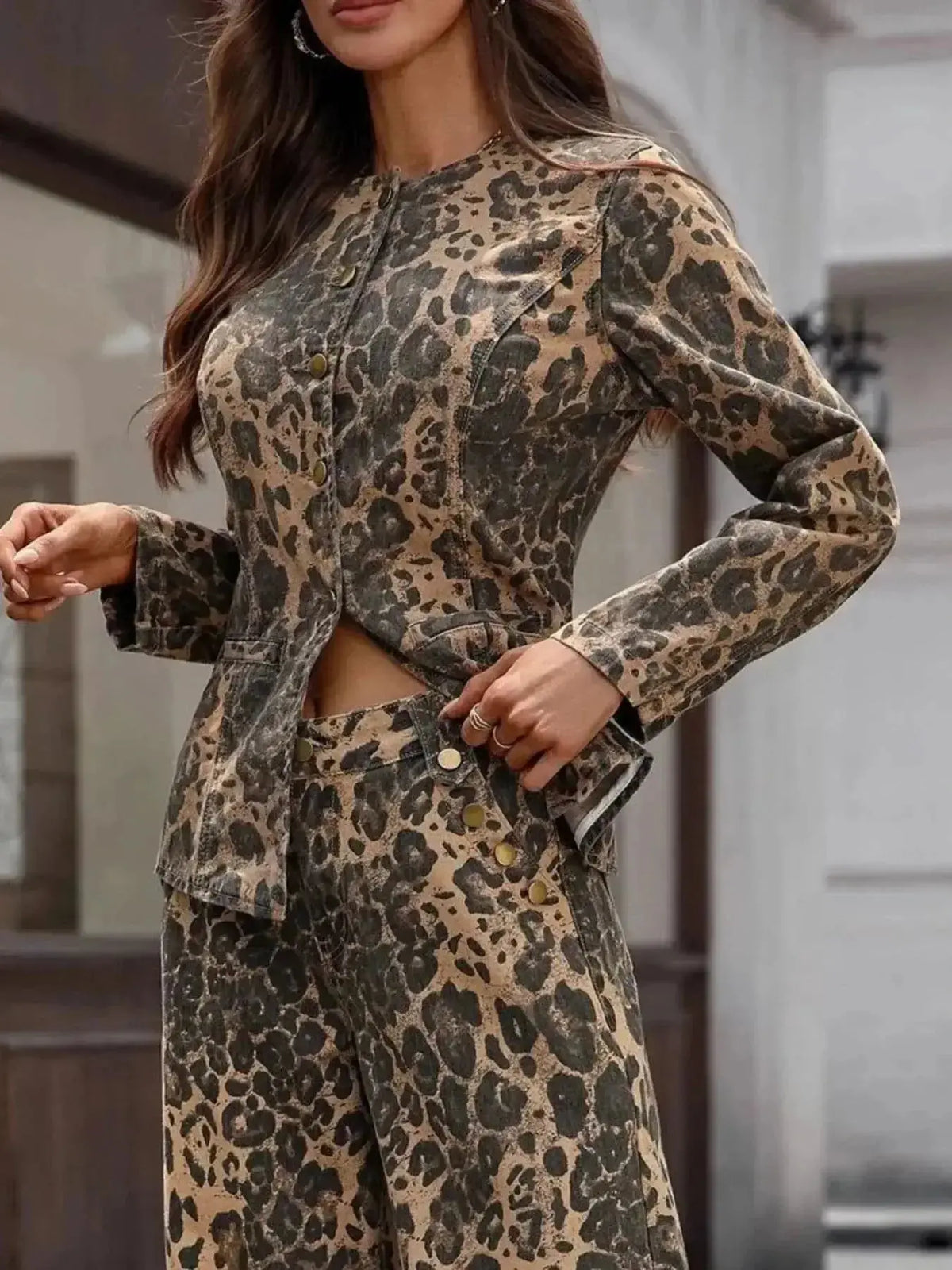 Women's long sleeve leopard print denim button-up blouse by Plush Fashion Hub featuring stretchy fabric and stylish design.