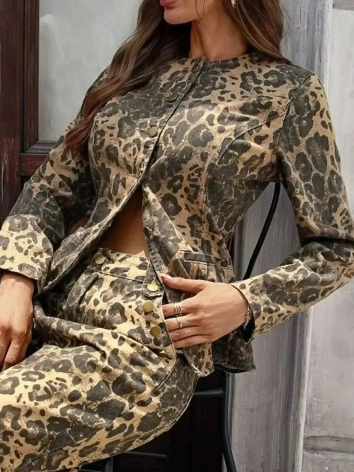 Women's long sleeve leopard print denim button-up blouse from Plush Fashion Hub, featuring stretchy material and stylish design.