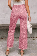 Leopard print high-waisted wide-leg jeans with frayed hem from Trendsi, showcasing stylish pattern and relaxed fit.