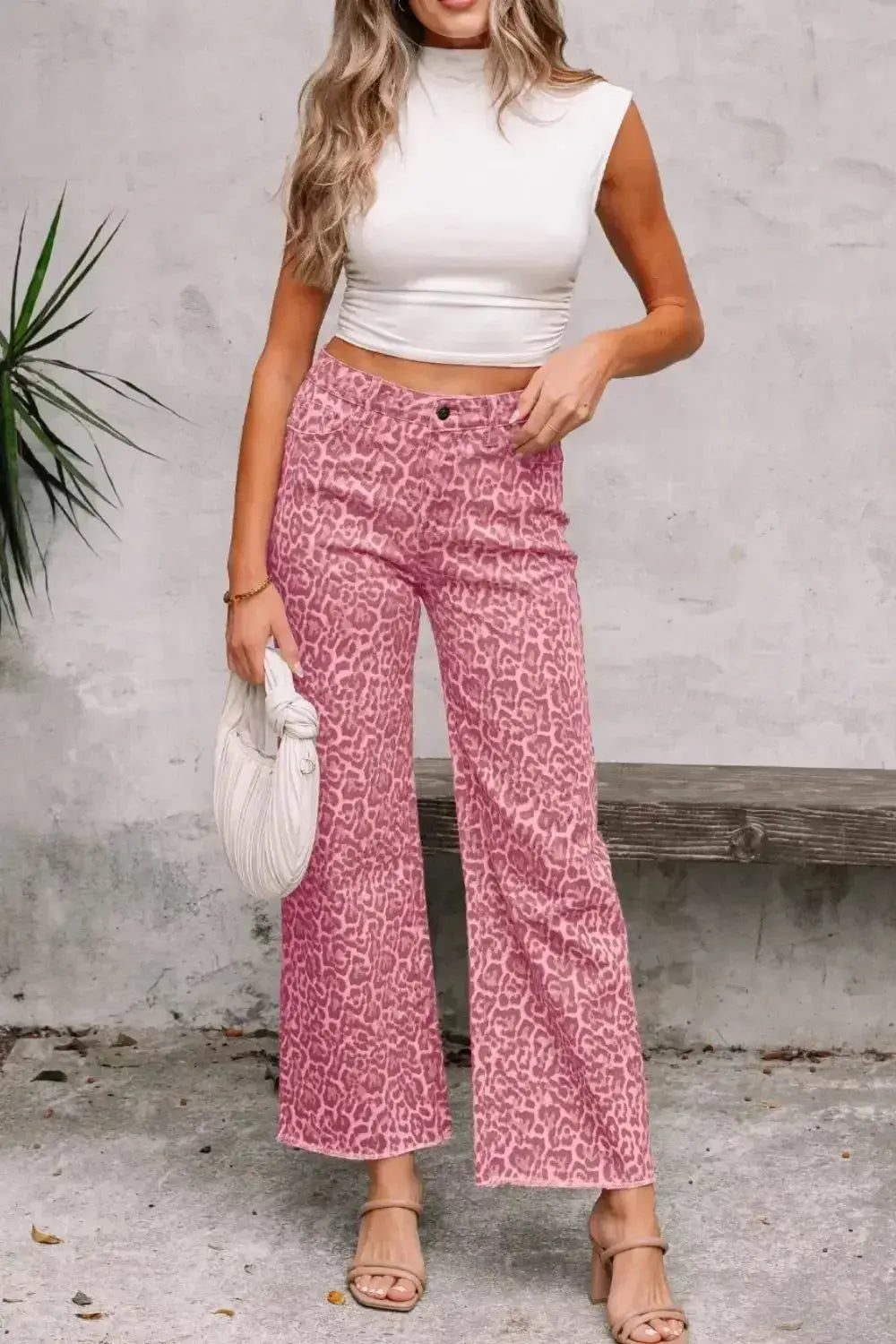 Leopard print high-waisted wide-leg jeans with frayed hem, stylish trendy denim by Trendsi.