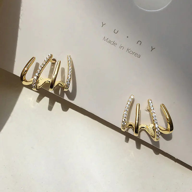 Trendy Fresh Style women's earrings and ear studs featuring sleek silver design with modern accents.